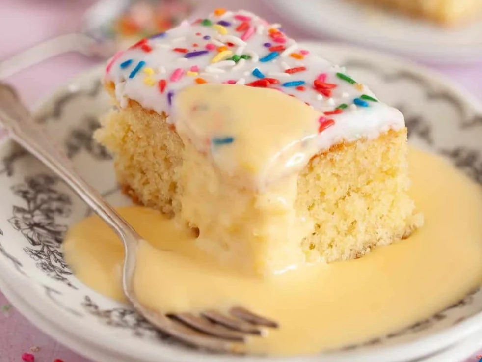 Back2School Sponge Cake - a square of sprinkle-iced vanilla sponge drowned in hot custard, from Ashville Hot Chicken, JLT Dubai