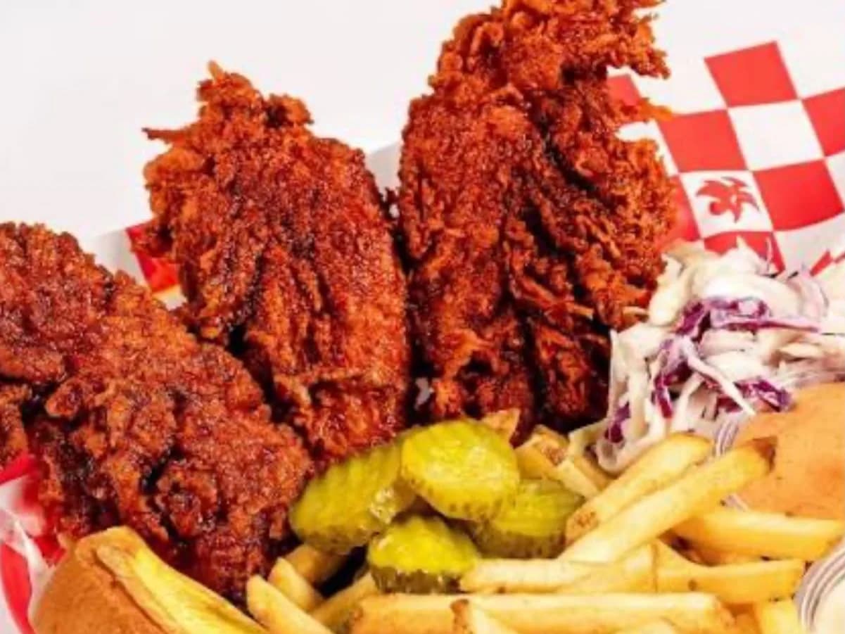 Nashville Tenders & Slaw - two Nashville hot fried chicken tenders on toasted bread with creamy slaw, pickles and fries, from Ashville Hot Chicken, JLT Dubai